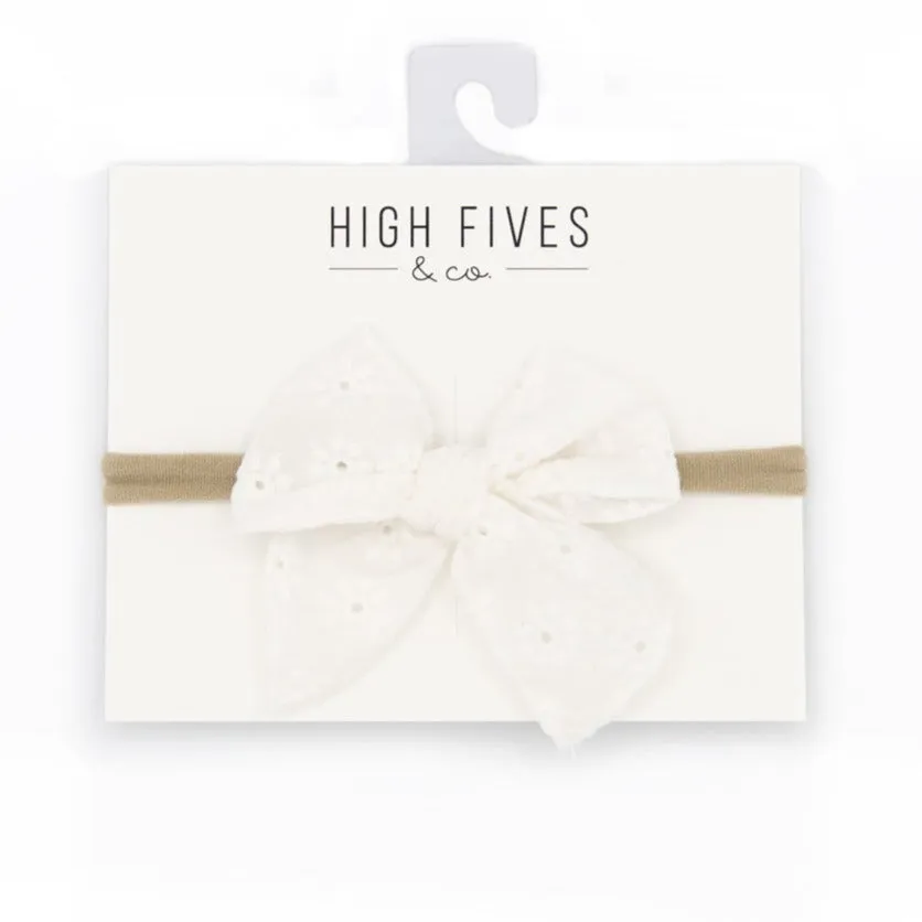 Eyelet Lace Bow with Pointed Tails on Nylon Headband